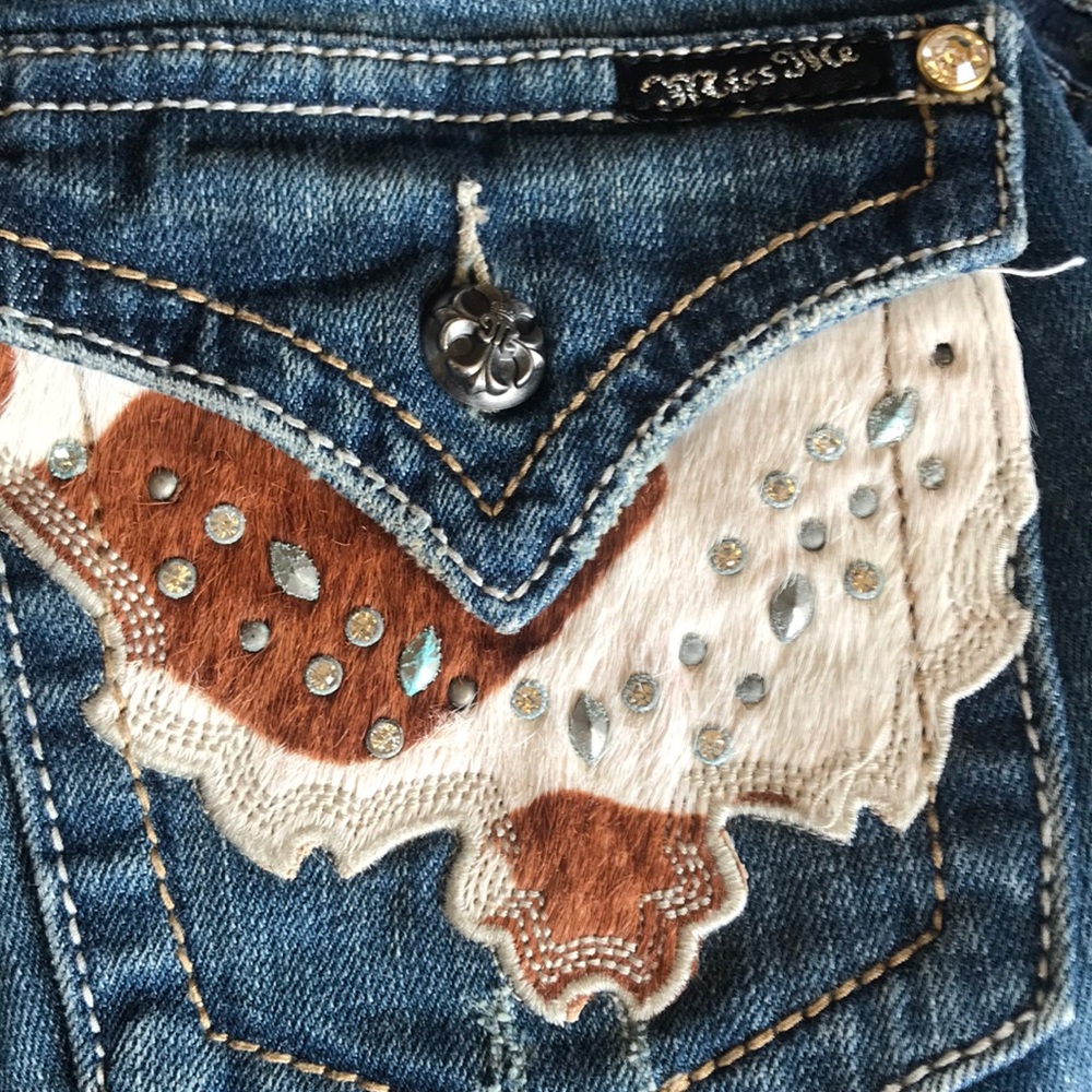 Miss me jeans with real calf hair on pockets.